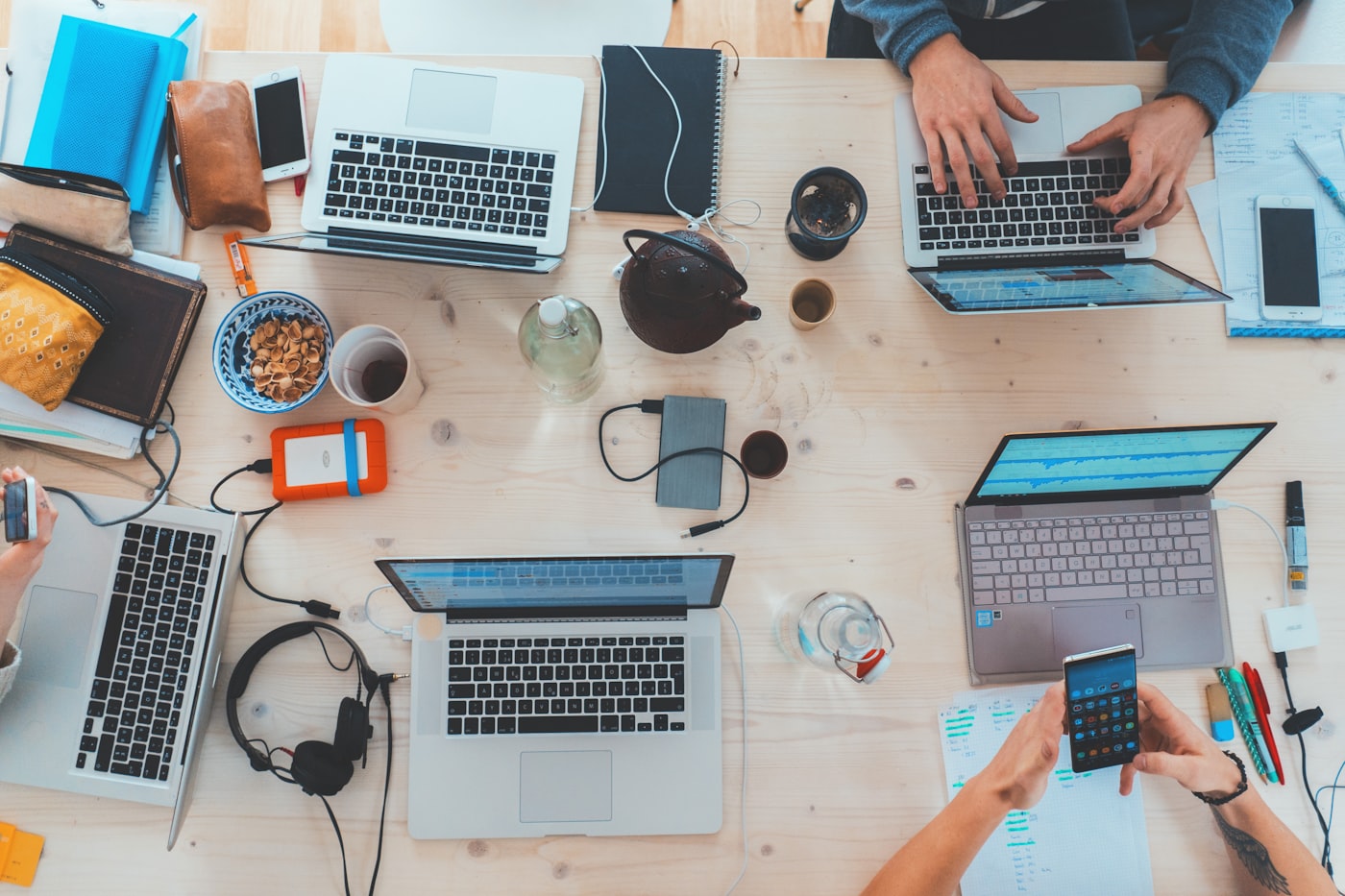Laptops and phones managed across a team workspace